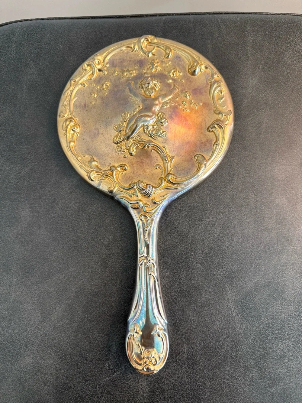Vintage Early 1900Ss Ornate Gold-Tone Cherub design Heavy Hand Held Mirror